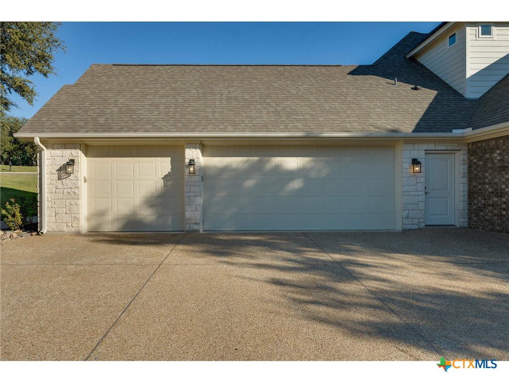 1729 Las Lomas Court Temple, TX 76502 - Photo 33 of 43 Garage front with wide driveway