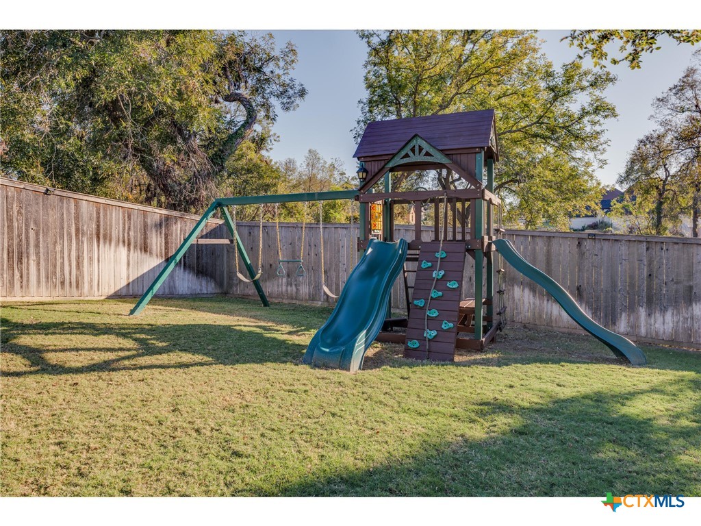 1729 Las Lomas Court Temple, TX 76502 - Photo 42 of 43 Backyard playset great for outdoor fun
