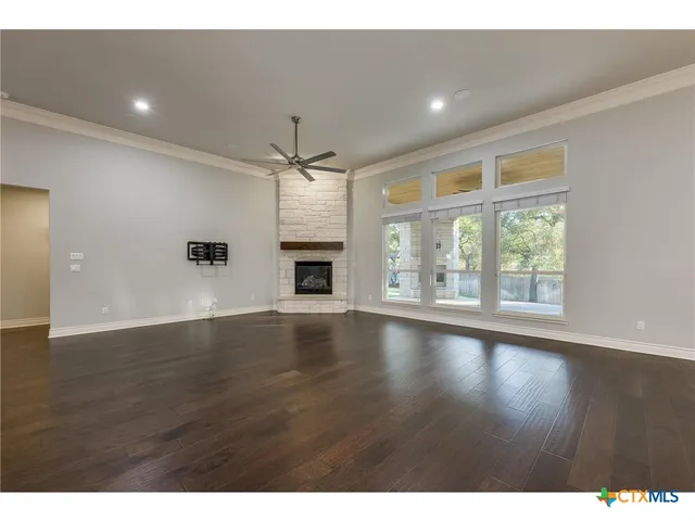 a kitchen with a sink stainless steel appliances and cabinets