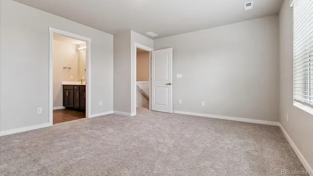 an empty room with window