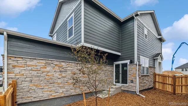 a front view of a house with garage