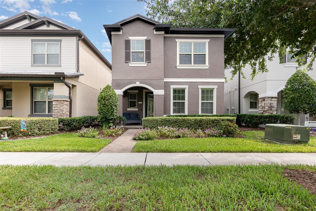 14215 Lakeview Park Road Winter Garden, FL 34787 - Photo 1 of 1 a front view of a house with a yard