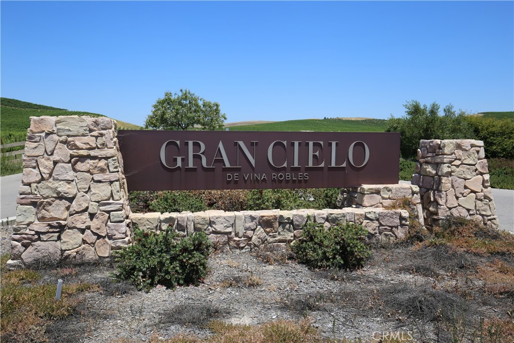 14 Rita Street Paso Robles, CA 93446 - Photo 4 of 14 a view of outdoor space with signage and flags
