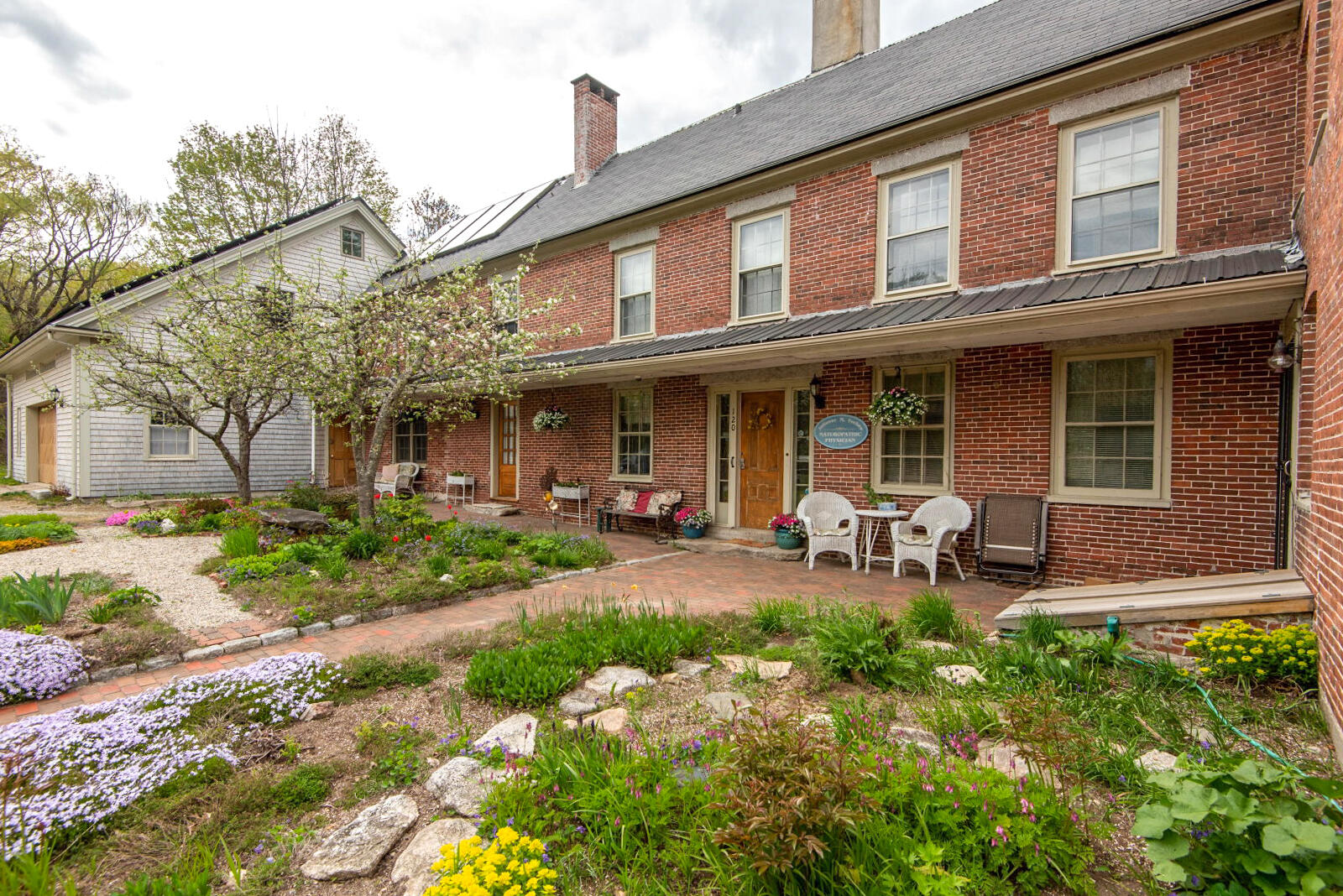 120 North Bridgton Road Bridgton, ME 04009 - Photo 7 of 89 Front Courtyard & 60' covered porch