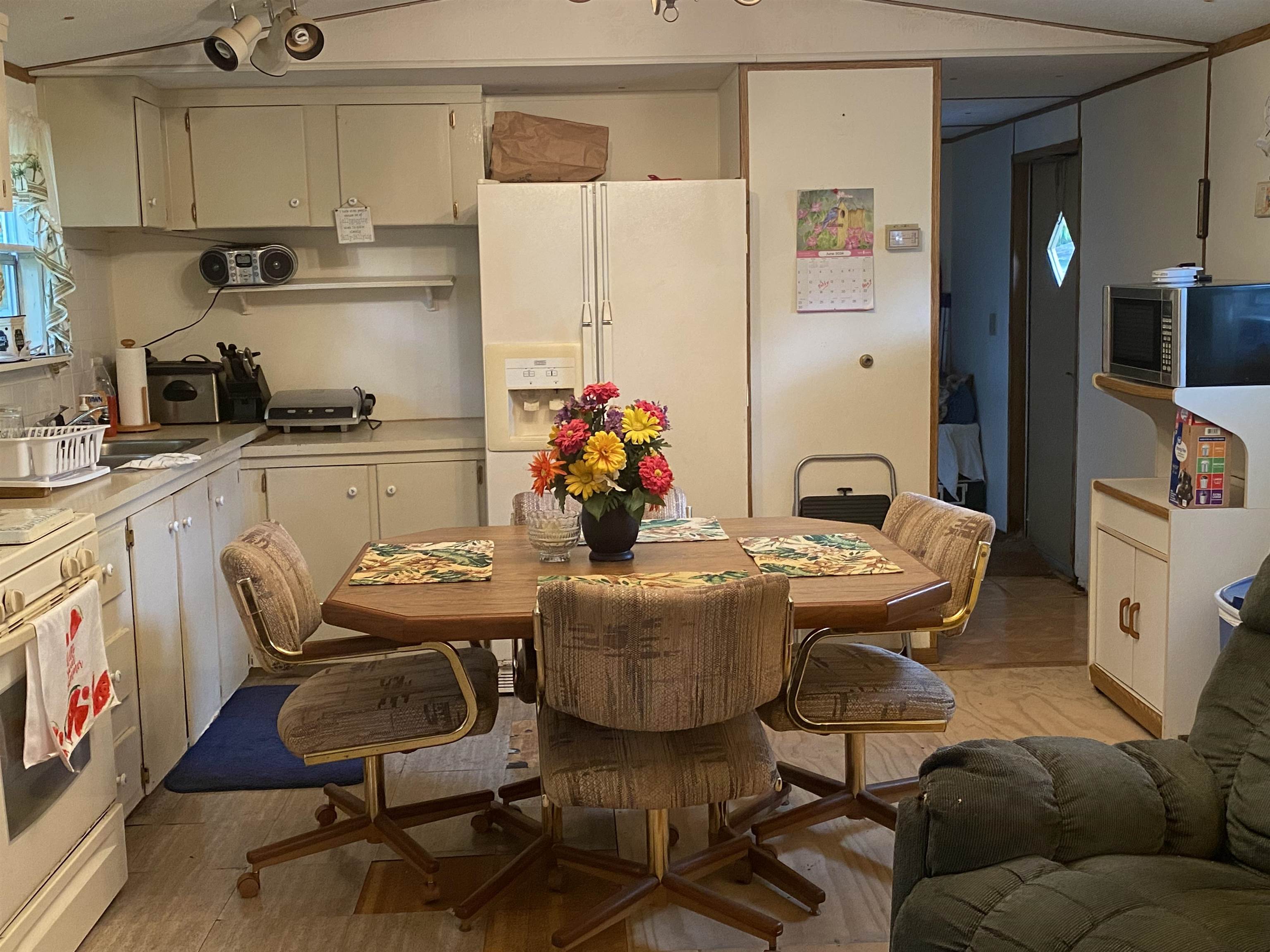 829 Oakes Avenue St. Augustine, FL 32084 - Photo 9 of 10 a living room with furniture and wooden floor