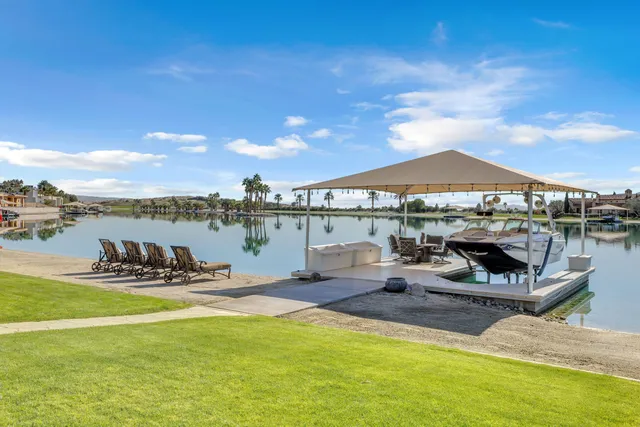 a view of walk in entryway with wooden floor and stairs
