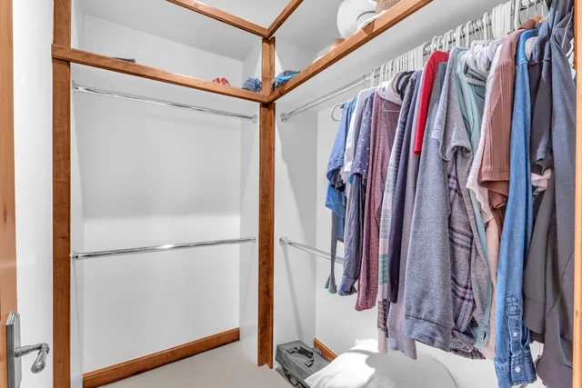 a bathroom with a toilet a sink and a shower