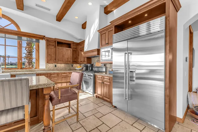 a view of a entryway with furniture and front door