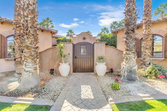 a bathroom with a granite countertop shower a sink and a granite counter top