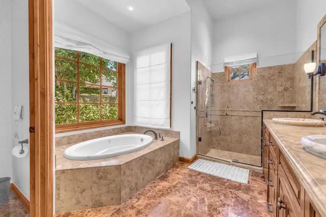 a bathroom with a sink and a window