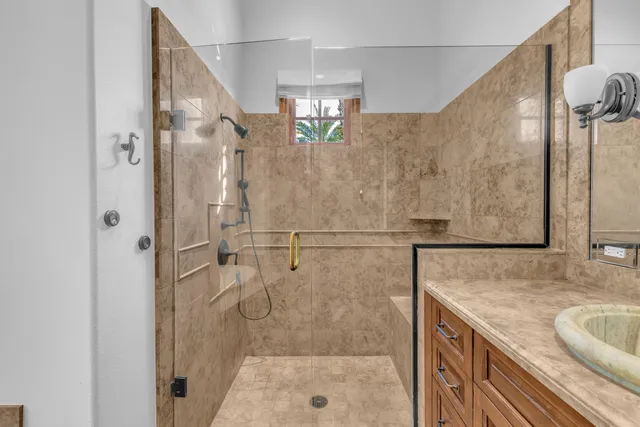 a swimming pool with outdoor seating and yard