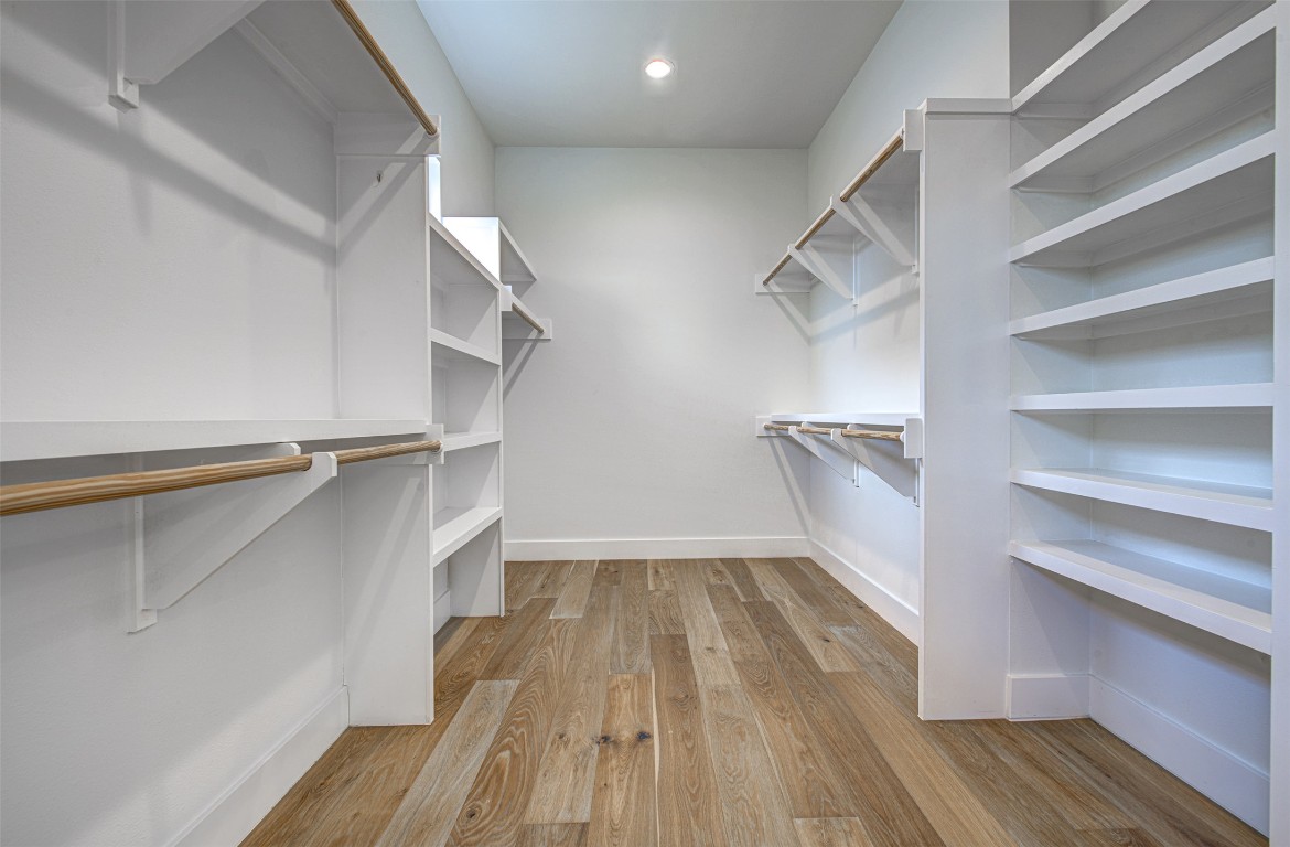 14210 Fort Smith Trail Austin, TX 78734 - Photo 21 of 37 a view of walk in closet with empty racks