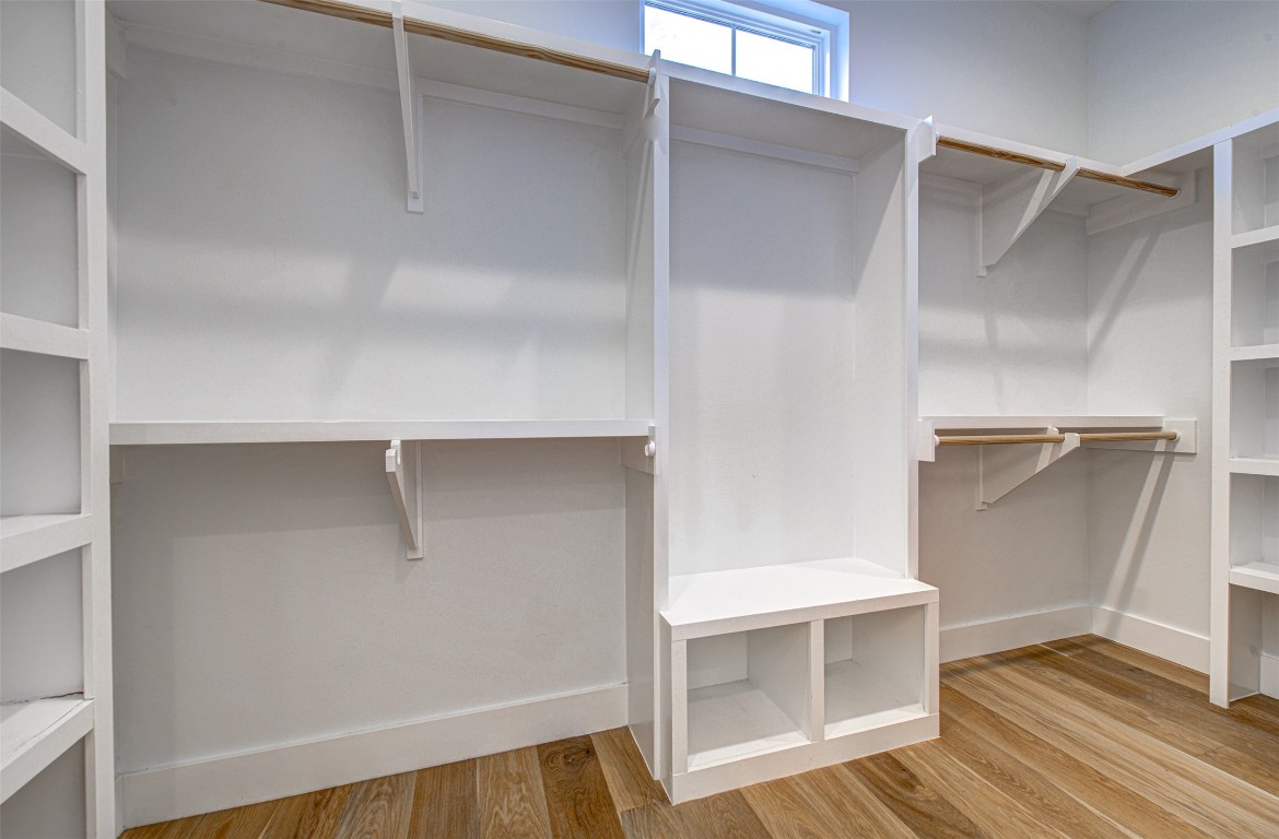 14210 Fort Smith Trail Austin, TX 78734 - Photo 22 of 37 a bathroom with a toilet and a shower