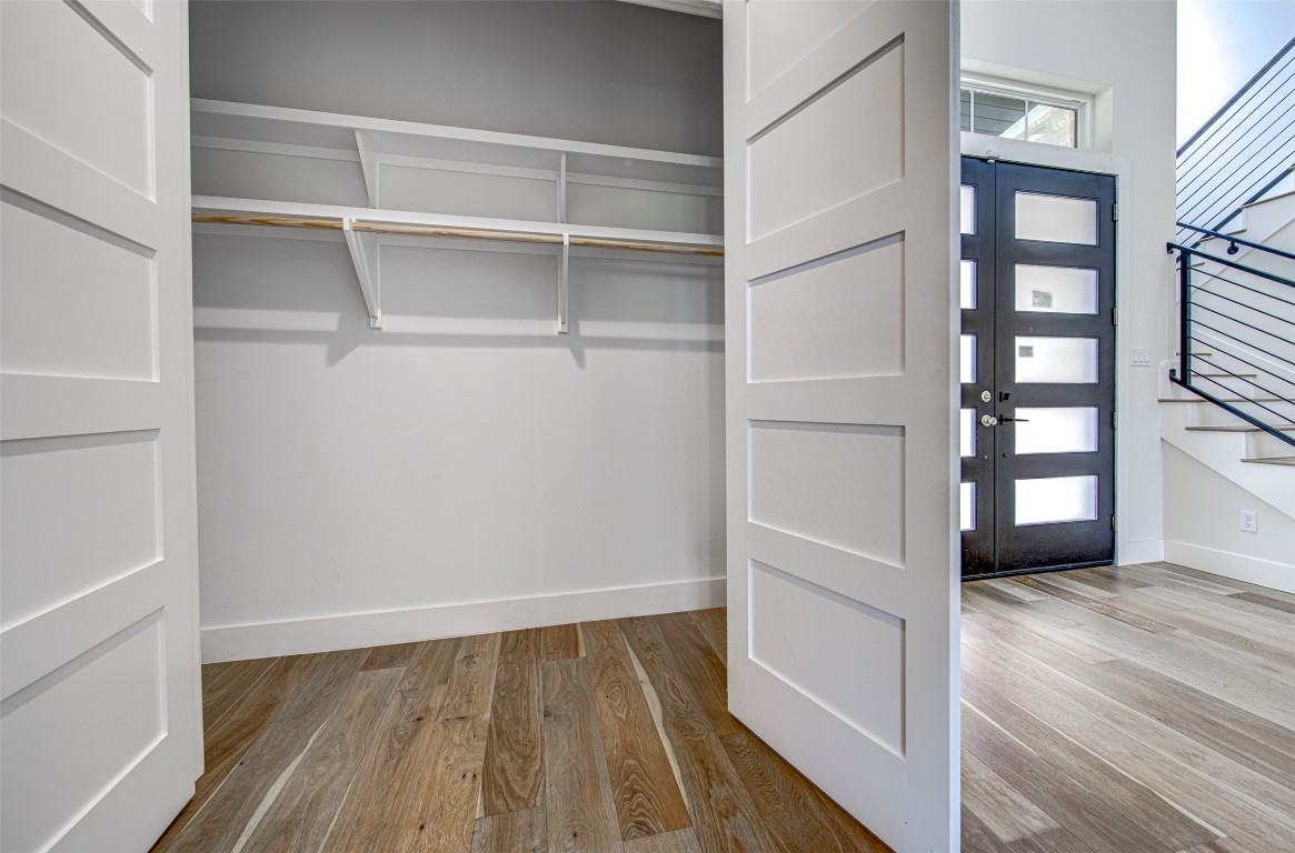 14210 Fort Smith Trail Austin, TX 78734 - Photo 23 of 37 a view of walk in closet with empty racks