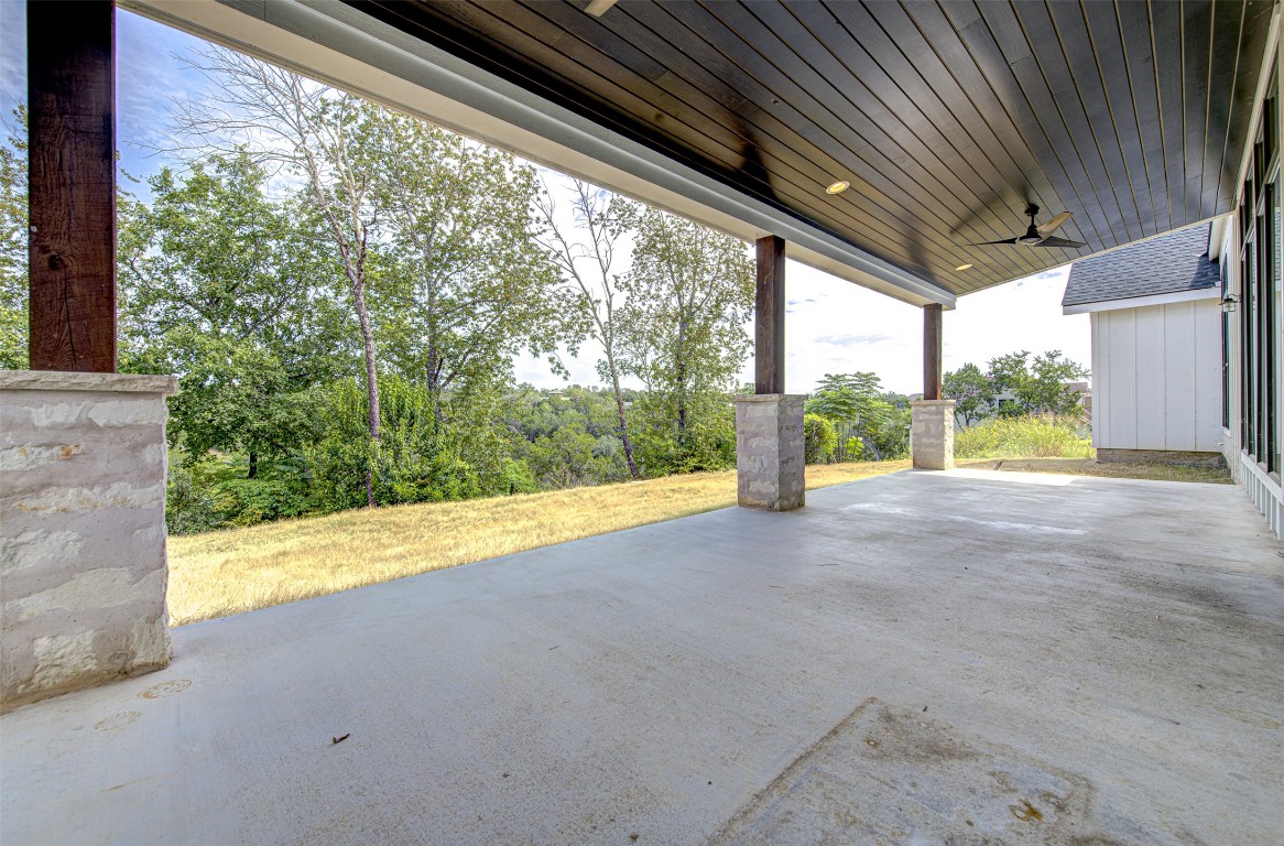 14210 Fort Smith Trail Austin, TX 78734 - Photo 33 of 37 a view of a room with porch and wooden roof