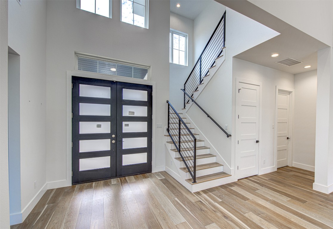 14210 Fort Smith Trail Austin, TX 78734 - Photo 4 of 37 a view of an entryway with wooden floor