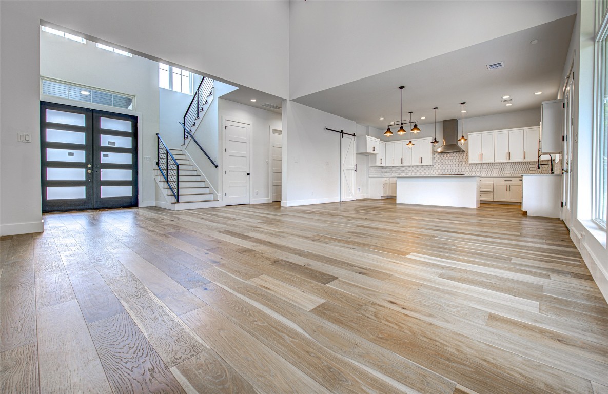 14210 Fort Smith Trail Austin, TX 78734 - Photo 6 of 37 a view of kitchen with furniture and wooden floor