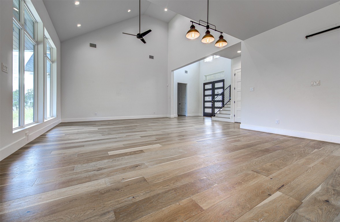 14210 Fort Smith Trail Austin, TX 78734 - Photo 7 of 37 wooden floor in an empty room with a window