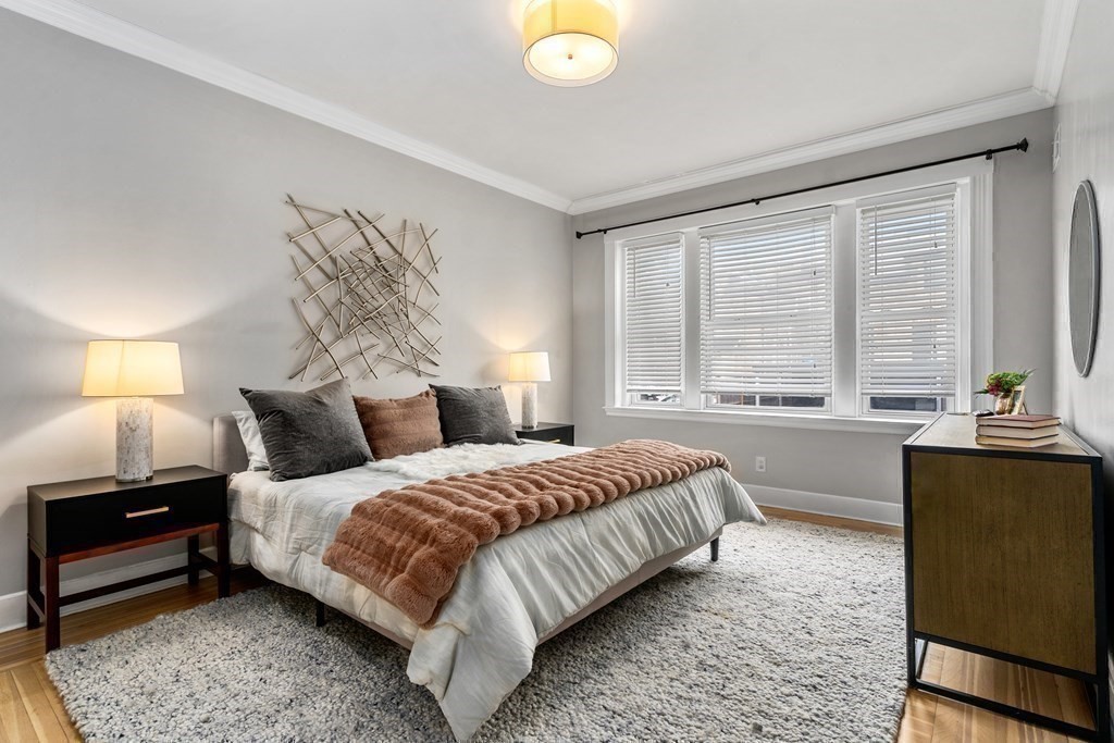 14 Warwick Road, Unit 1 Brookline, MA 02445 - Photo 11 of 29 a bedroom with a bed and a window