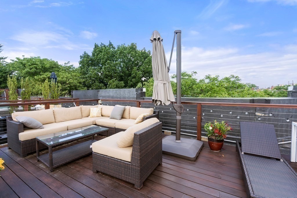 14 Warwick Road, Unit 1 Brookline, MA 02445 - Photo 18 of 29 a view of a couches in a patio