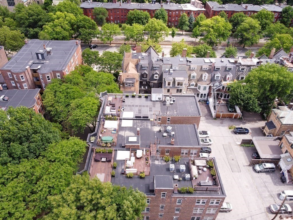 14 Warwick Road, Unit 1 Brookline, MA 02445 - Photo 19 of 29 an aerial view of multiple houses with yard