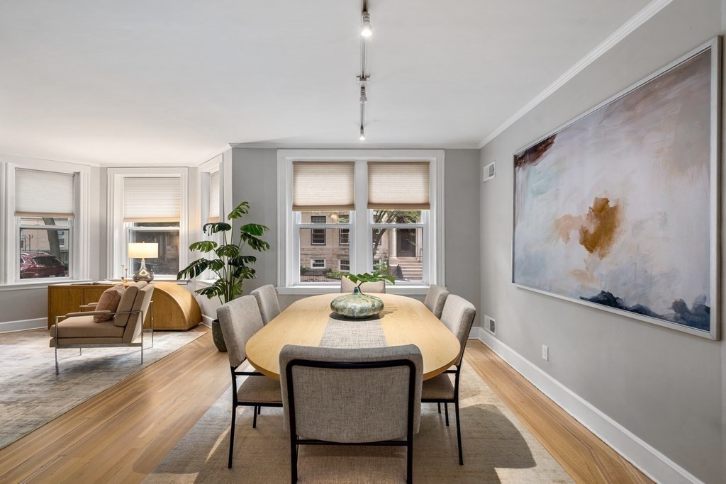 14 Warwick Road, Unit 1 Brookline, MA 02445 - Photo 4 of 29 a view of a dining room with furniture window and wooden floor