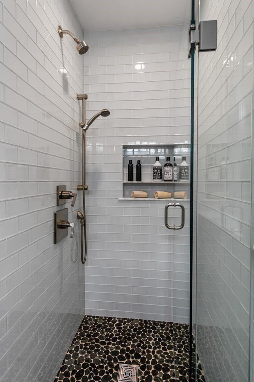 14 Warwick Road, Unit 1 Brookline, MA 02445 - Photo 10 of 29 a bathroom with a sink a toilet and shower