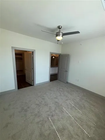 a view of a livingroom with a ceiling fan