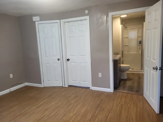 wooden floor and closet in a room