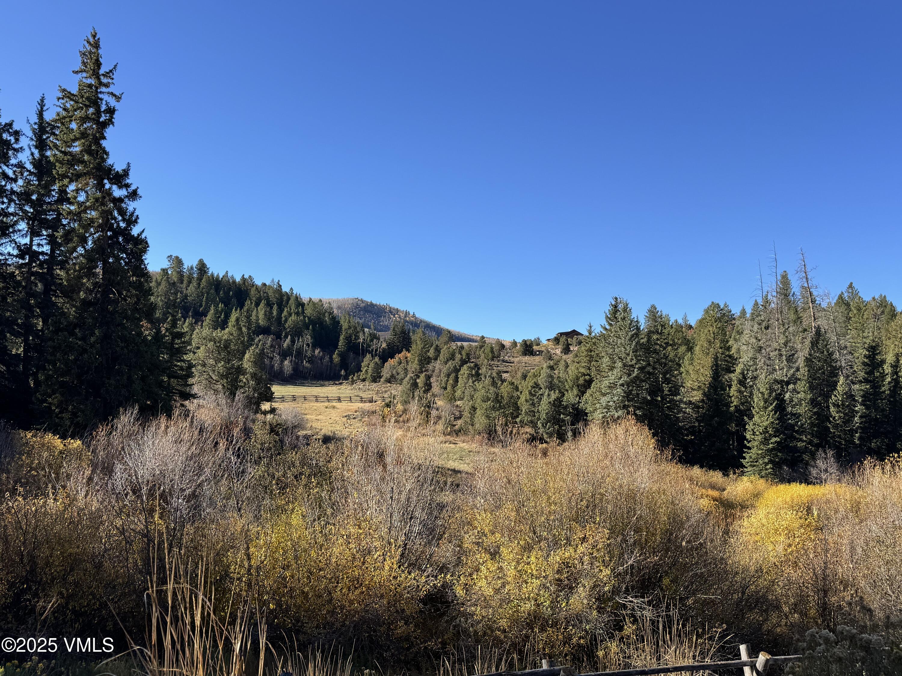 Tbd Salt Creek Road Eagle, CO 81631 - Photo 6 of 12 a view of a lake with a mountain in the background