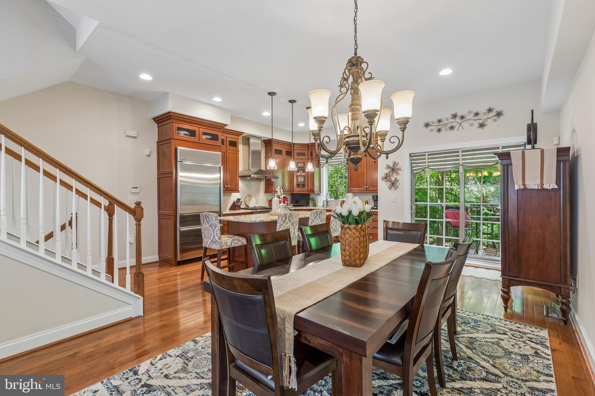 852 Independence Court Philadelphia, PA 19147 - Photo 12 of 31 a dining room with furniture a chandelier and wooden floor
