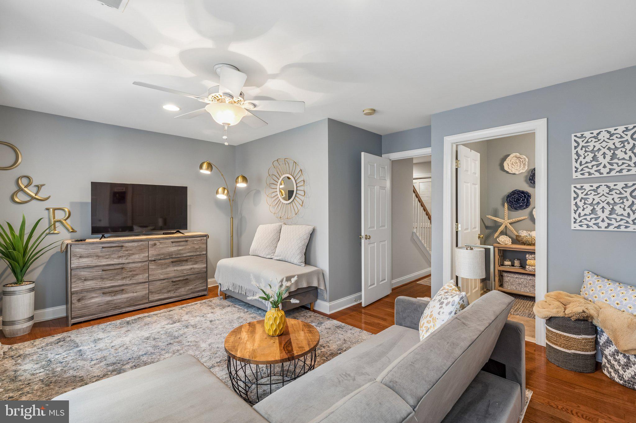 852 Independence Court Philadelphia, PA 19147 - Photo 22 of 31 a living room with furniture and a flat screen tv