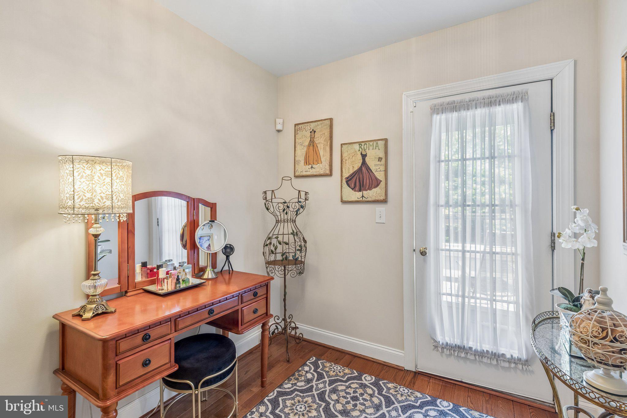 852 Independence Court Philadelphia, PA 19147 - Photo 23 of 31 a room with chandelier fan and wooden floor
