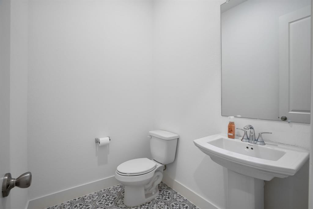 1143 Queensdown Way Forney, TX 75126 - Photo 17 of 40 half bath on first floor