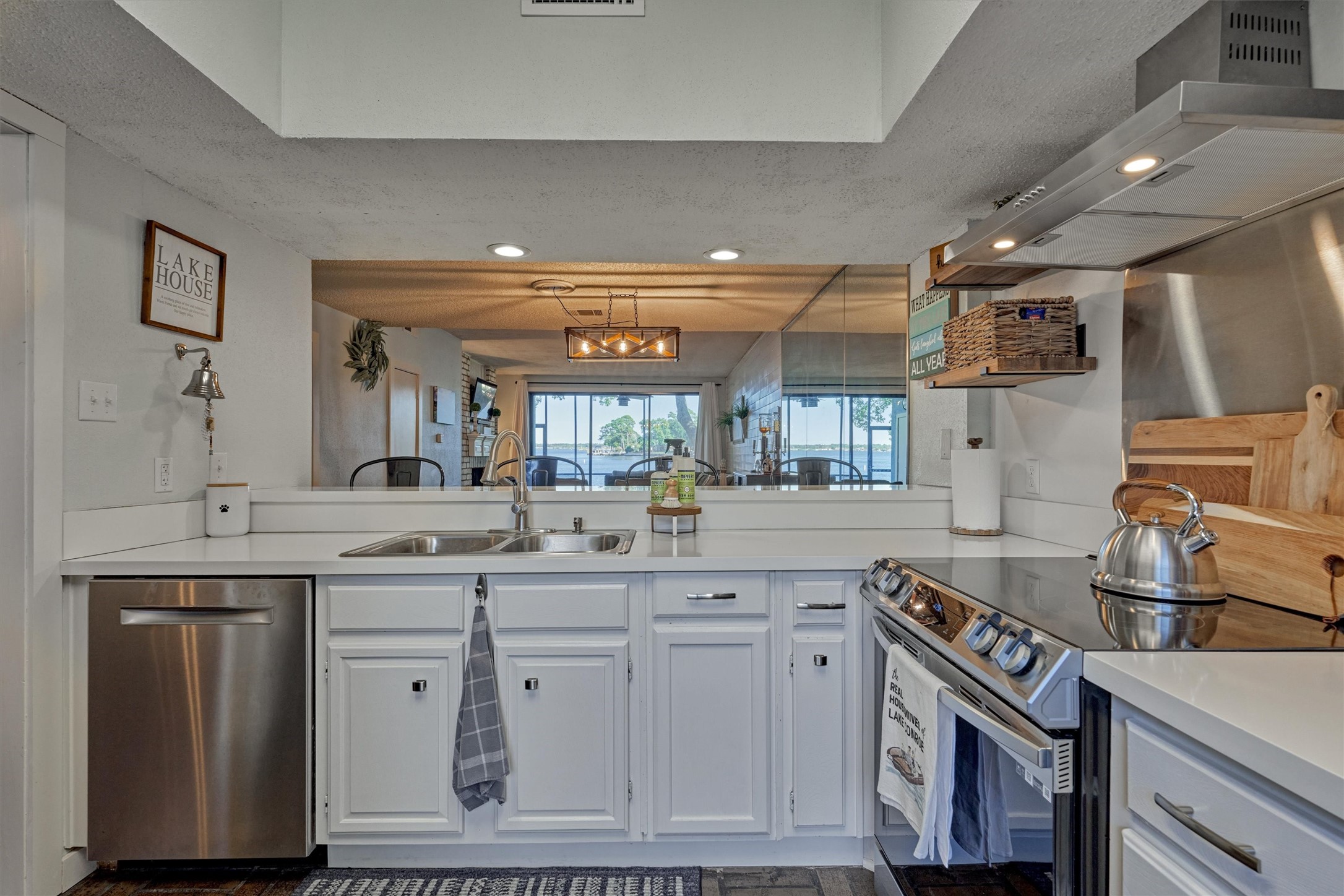 1428 Bowsprit Point Willis, TX 77318 - Photo 13 of 47 a kitchen with cabinets and window