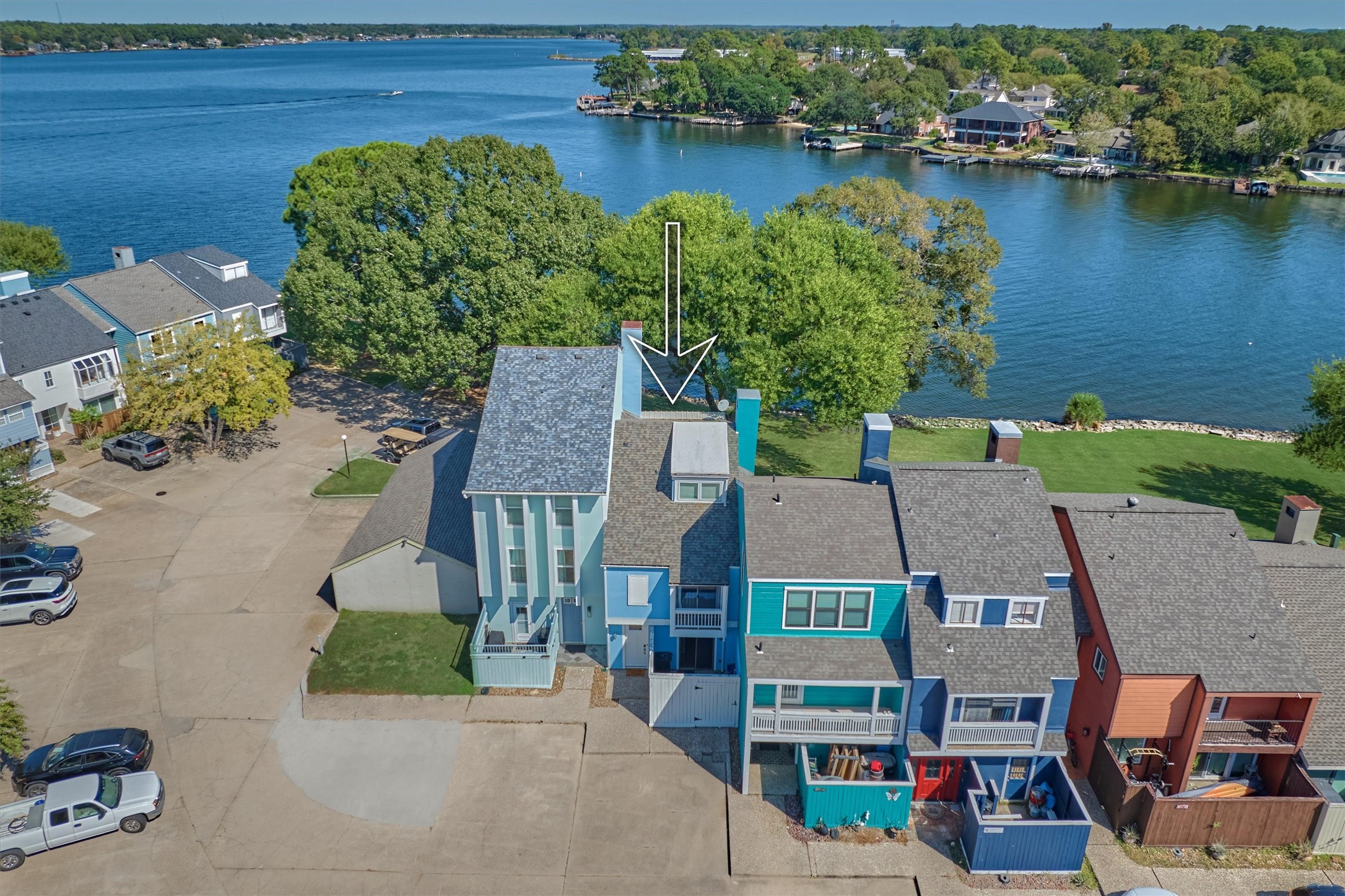 1428 Bowsprit Point Willis, TX 77318 - Photo 2 of 47 an aerial view of a house with a lake view