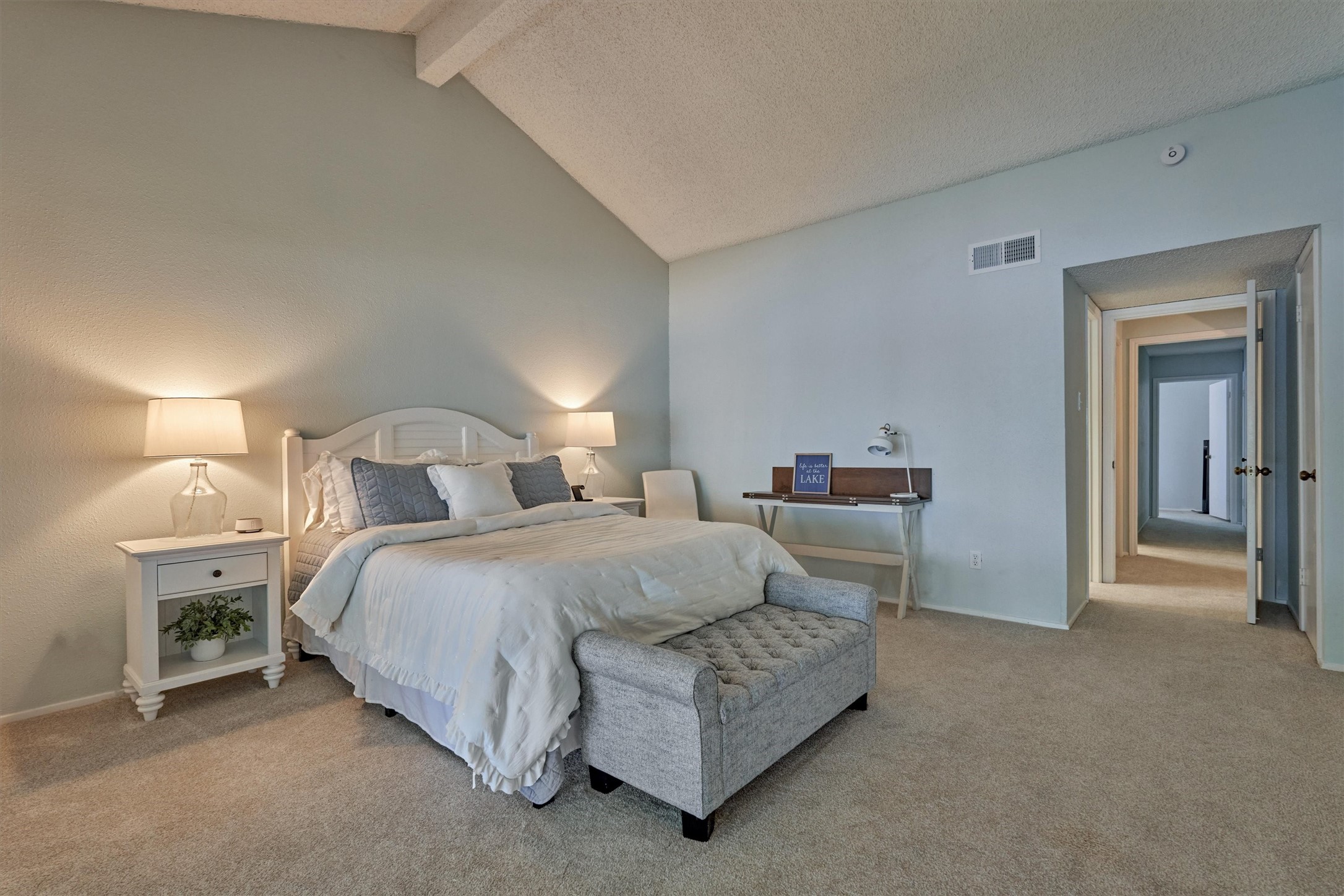 1428 Bowsprit Point Willis, TX 77318 - Photo 30 of 47 a bedroom with bed and a lamp