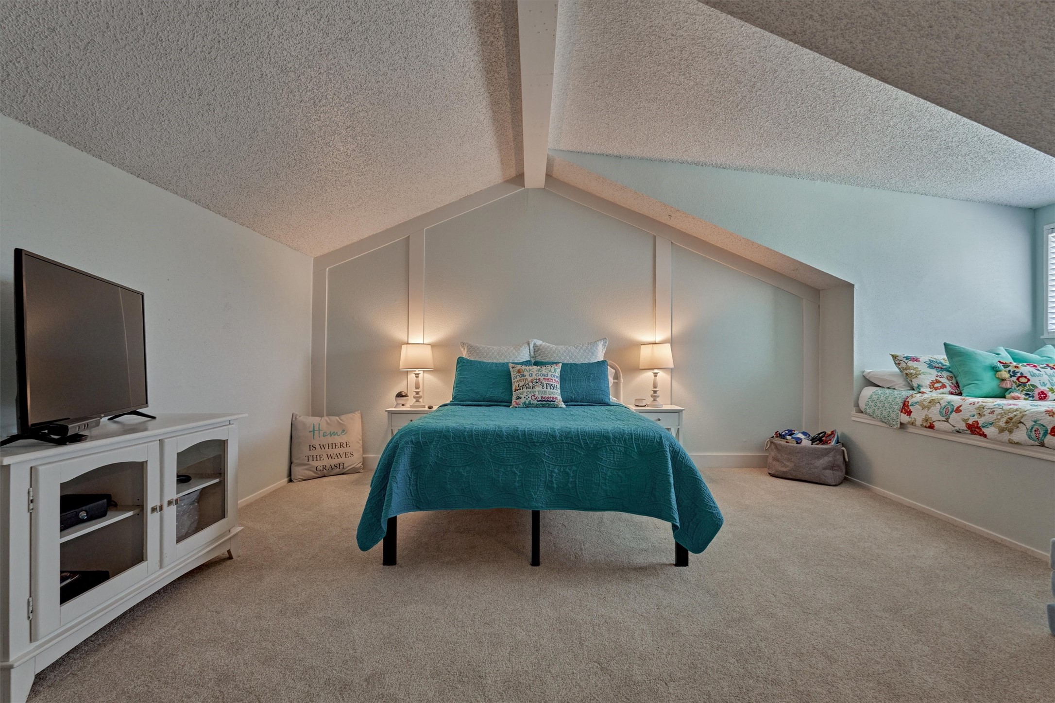 1428 Bowsprit Point Willis, TX 77318 - Photo 35 of 47 a bedroom with furniture and a flat screen tv