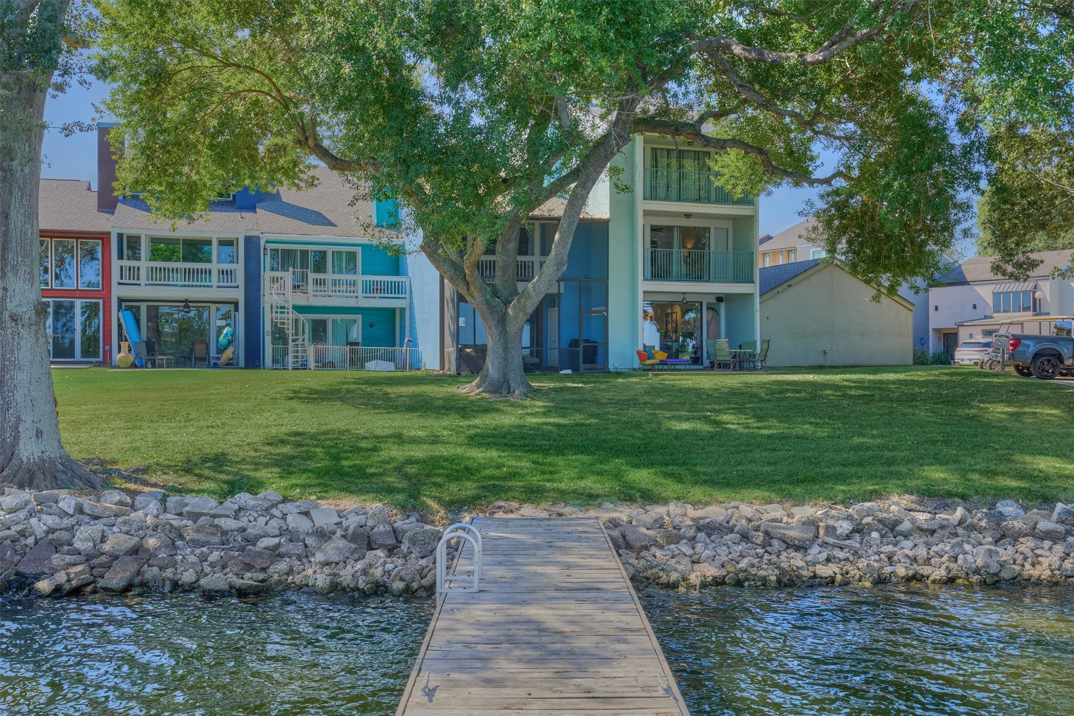 1428 Bowsprit Point Willis, TX 77318 - Photo 39 of 47 a front view of a house with a yard and trees
