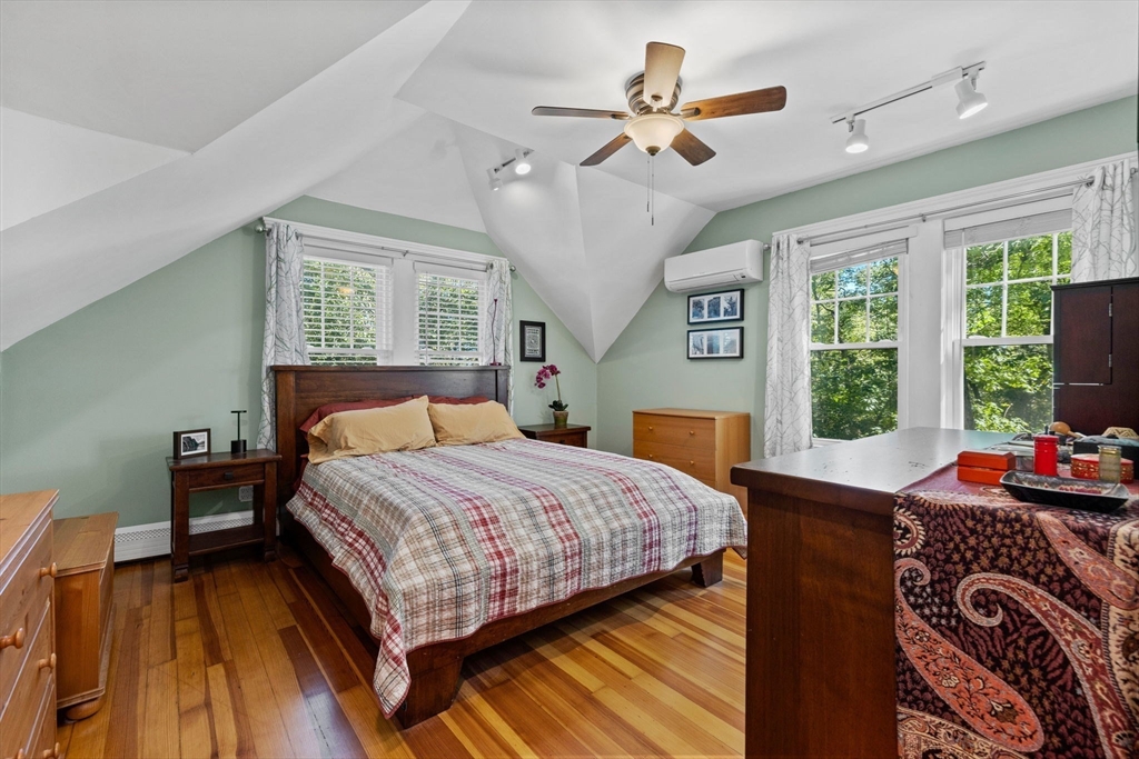 153 Ashcroft Road Medford, MA 02155 - Photo 18 of 39 a bedroom with a bed and a large window