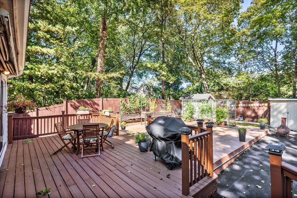 153 Ashcroft Road Medford, MA 02155 - Photo 34 of 39 a view of a chairs and tables in the balcony