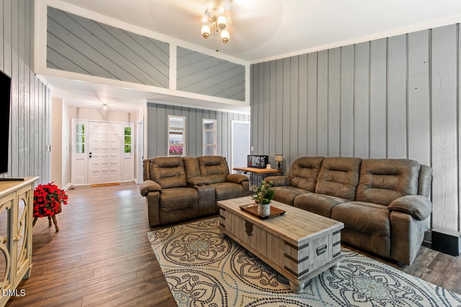 134 Longview Road Madison, NC 27025 - Photo 6 of 49 a living room with furniture ceiling fan and a rug