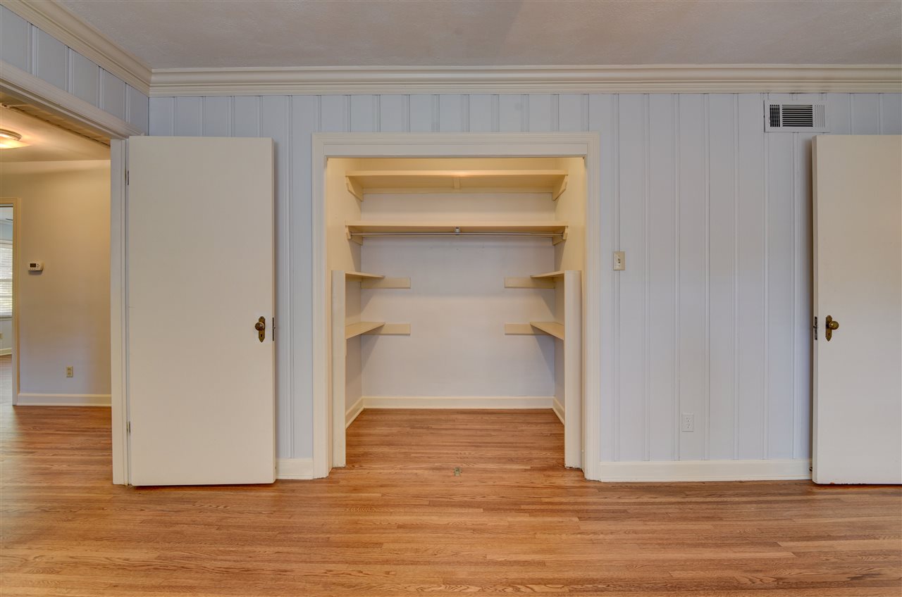 4053 Minden Road Memphis, TN 38117 - Photo 14 of 22 a view of an empty room with wooden floor and closet