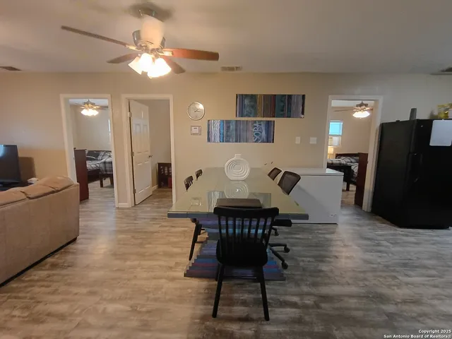 a view of a dining room with furniture