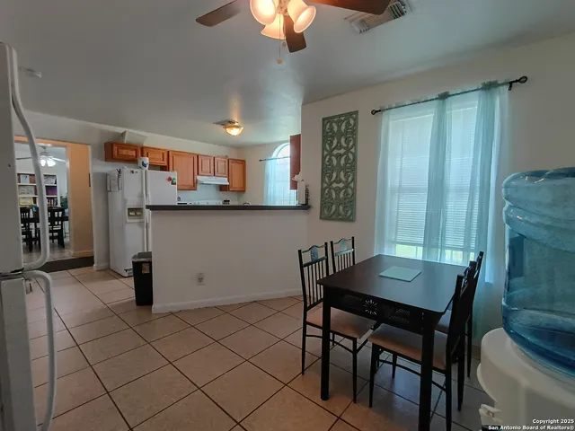 a view of a dining room with furniture