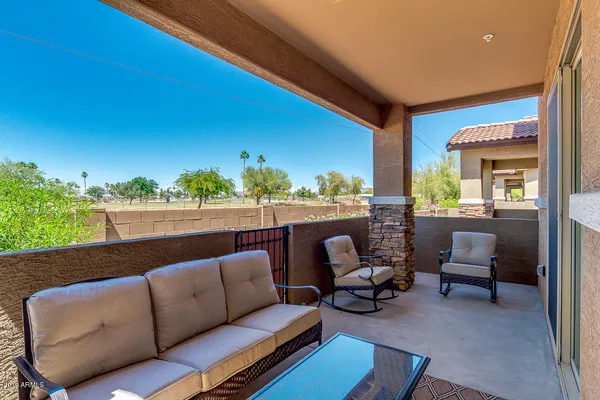 a outdoor living space with furniture and city view