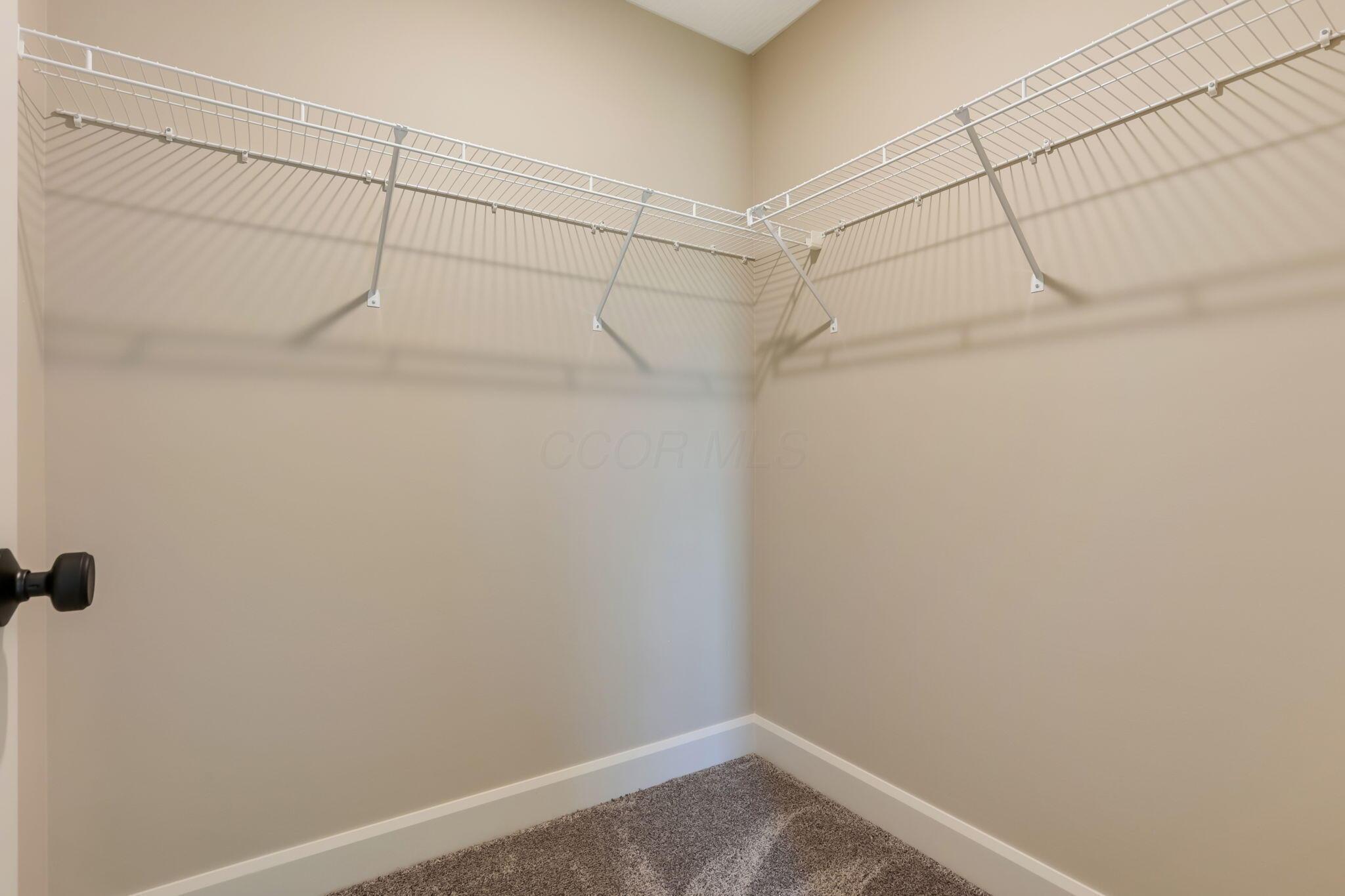 9007 Columbia Road Southwest Pataskala, OH 43062 - Photo 43 of 70 3rd bedroom large walk-in closet