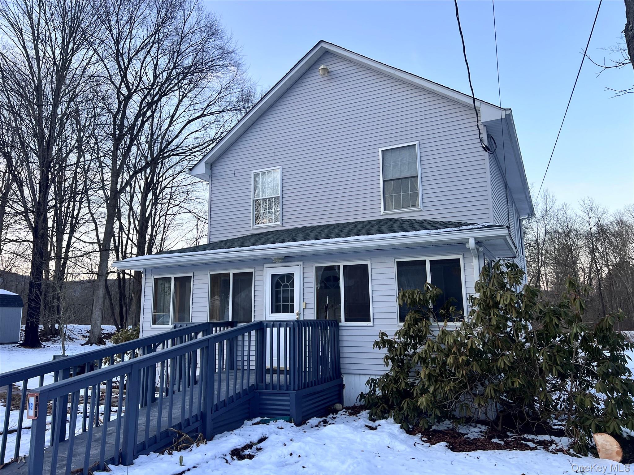 13 Herlings Road Wurtsboro, NY 12790 - Photo 1 of 33 Home with access ramp and enclosed porch.