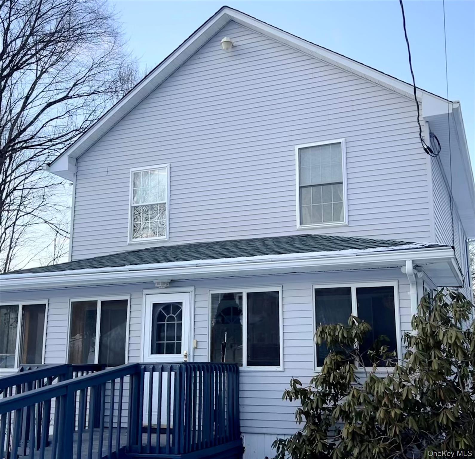 13 Herlings Road Wurtsboro, NY 12790 - Photo 2 of 37 a front view of a house with plants