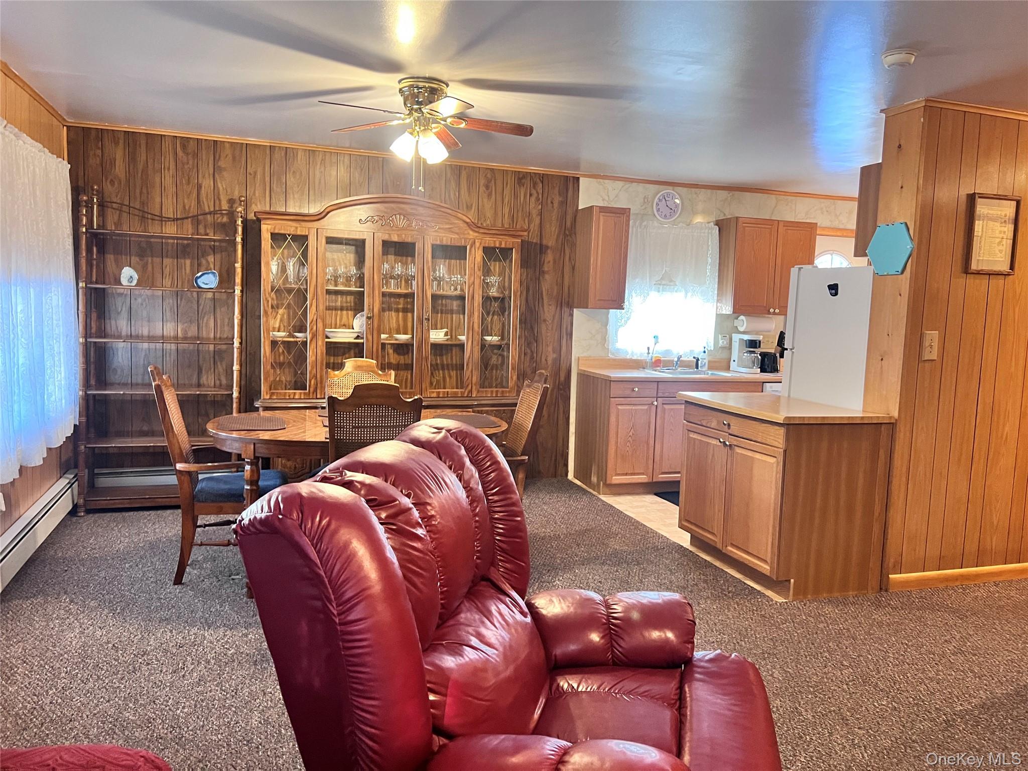 13 Herlings Road Wurtsboro, NY 12790 - Photo 7 of 37 a bed room with a bed and a chandelier